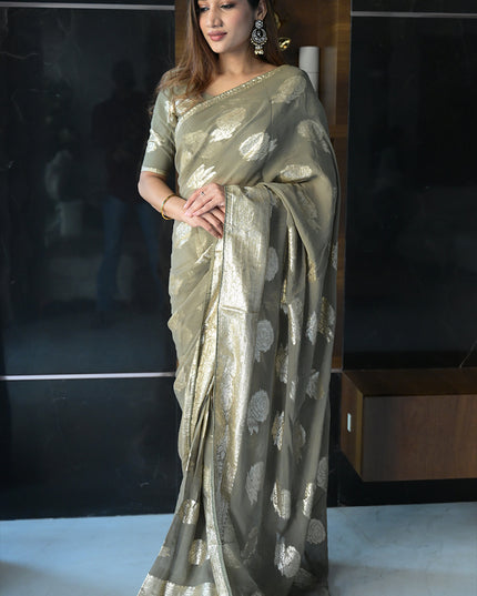 Ethereal Sage Green Banarasi Georgette Saree with Antique Gold Butas