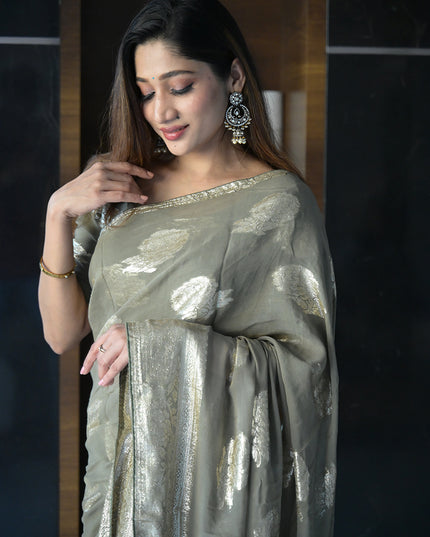 Ethereal Sage Green Banarasi Georgette Saree with Antique Gold Butas