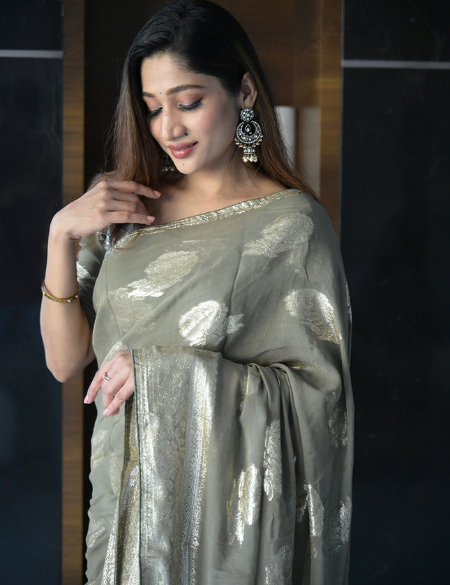 Ethereal Sage Green Banarasi Georgette Saree with Antique Gold Butas