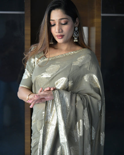 Ethereal Sage Green Banarasi Georgette Saree with Antique Gold Butas